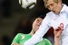 England's striker Peter Crouch (R) heads the ball ahead of Algeria's defender Anther Yahia during the Group C first round 2010 World Cup football match England vs. Algeria on June 18, 2010 at Green Point stadium in Cape Town. NO PUSH TO MOBILE / MOBILE USE SOLELY WITHIN EDITORIAL ARTICLE - AFP PHOTO / JEWEL SAMAD