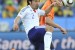 Japan's midfielder Yuki Abe (L) fights for the ball with Netherlands' striker Klaas-Jan Huntelaar during their Group E first round 2010 World Cup football match on June 19, 2010 at Moses Mabhida stadium in Durban. NO PUSH TO MOBILE / MOBILE USE SOLELY WITHIN EDITORIAL ARTICLE - AFP PHOTO / ARIS MESSINIS