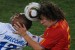 Honduras' striker George Welcome (L) and Spain's defender Carles Puyol head the ball during the Group H first round 2010 World Cup football match Spain vs. Honduras on June 21, 2010 at Ellis Park stadium in Johannesburg. NO PUSH TO MOBILE / MOBILE USE SOLELY WITHIN EDITORIAL ARTICLE -- AFP PHOTO / PEDRO UGARTE