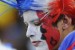 A France supporter looks dejected after South Africa's striker Katlego Mphela (unseen) scored during the Group A first round 2010 World Cup football match France vs. South Africa on June 22, 2010 at Free State Stadium in Mangaung/Bloemfontein. NO PUSH TO MOBILE / MOBILE USE SOLELY WITHIN EDITORIAL ARTICLE - AFP PHOTO / GIANLUIGI GUERCIA