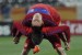 Serbia's defender Antonio Rukavina (top) stretches with the help of midfielder Zoran Tosic during a training session at the Mbombela Stadium in Nelspruit, on June 22, 2010. Serbia will face Australia in Nelspruit on June 23 in their last opening round 2010 World Cup football match. AFP PHOTO / NATALIA KOLESNIKOVA