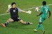 Nigeria's striker Obafemi Martins (R) vies with South Korea's goalkeeper Jung Sung-Ryong during their Group B first round 2010 World Cup football match on June 22, 2010 at Moses Mabhida stadium in Durban. NO PUSH TO MOBILE / MOBILE USE SOLELY WITHIN EDITORIAL ARTICLE AFP PHOTO / CARL DE SOUZA