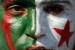 An Algeria supporter, with the Algerian flag painted on his face, is seen before the Group C first round 2010 World Cup football match US versus Algeria on June 23, 2010 at Loftus Verfeld stadium in Tshwane/Pretoria. NO PUSH TO MOBILE / MOBILE USE SOLELY WITHIN EDITORIAL ARTICLE - AFP PHOTO / JEWEL SAMAD