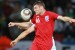 England's midfielder James Milner heads the ball during the Group C first round 2010 World Cup football match Slovenia vs. England on June 23, 2010 at Nelson Mandela Bay stadium in Port Elizabeth. NO PUSH TO MOBILE / MOBILE USE SOLELY WITHIN EDITORIAL ARTICLE - AFP PHOTO / KARIM JAAFAR
