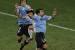 South Korea's midfielder Kim Jae-Sung (C) fights for the ball with Uruguay's defender Diego Lugano (L) and Uruguay's defender Mauricio Victorino during the 2010 World Cup round of 16 football match Uruguay vs. South Korea on June 26, 2010 at Nelson Mandela Bay stadium in Port Elizabeth. Uruguay beat South Korea 2-1. NO PUSH TO MOBILE / MOBILE USE SOLELY WITHIN EDITORIAL ARTICLE - AFP PHOTO / LIU JIN