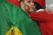 A Portugal supporter draped in a Portugal flag is seen after the 2010 World Cup round of 16 match Spain versus Portugal on June 29, 2010 at Green Point stadium in Capetown. Spain won the match 1-0. NO PUSH TO MOBILE / MOBILE USE SOLELY WITHIN EDITORIAL ARTICLE - AFP PHOTO / FRANCISCO LEONG