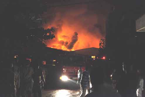 Project Fame Studios located inside Murhi International premises in flames last night. PHOTO: AKIN FARINTO.