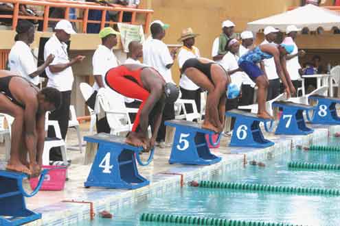 Swimmers get set for 100m action at the recently organised Randle tourney in Lagos, Nigeria. Nigerian swimmers have promised to perform well at the African Championship in Casablanca, Morocco. Photo: Akin Farinto.