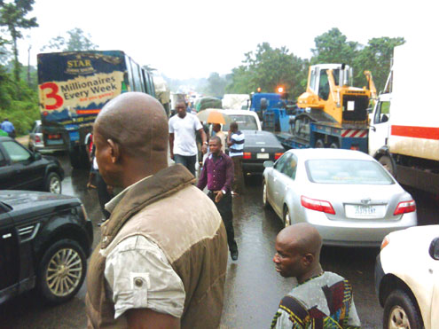 Travellers trapped on Benin-Ore highway for several hours at the weekend. Story on pg.6. PHOTOS: David Odey.