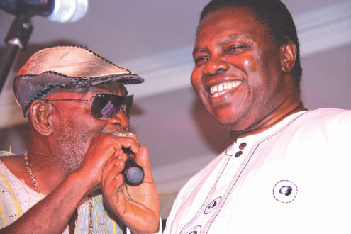 Fatai Rolling Dollar and Ebenzer Obey in a duet at the concert.