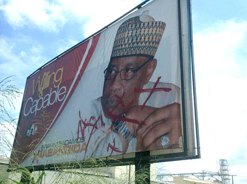Defaced IBBâ€™s campaign billboard in Ibadan, Oyo State, South West Nigeria. PHOTO: Gbenro Adesina