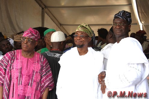 Gov. Rauf Aregbesola (m), with Aremo Segun Osoba and Gov. Fashola in Oshogbo at the weekend.