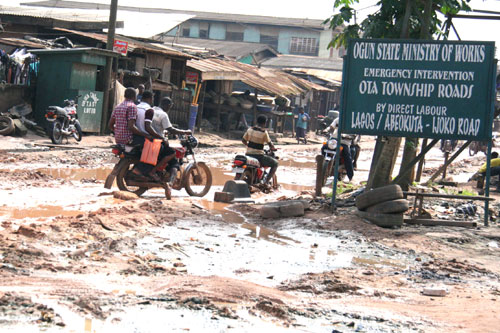 The abandoned Ijoko Road in Ogun State . Governor Daniel has embarked on cosmetic repairs of similar roads to impress his visitor,President Jonathan, that he is â€˜workingâ€<img src=