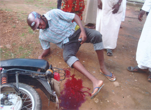 The â€˜okadaâ€™ rider shot  by robbers on Acme Road, Agidingbi. PHOTO.  Paul Iyoghojie