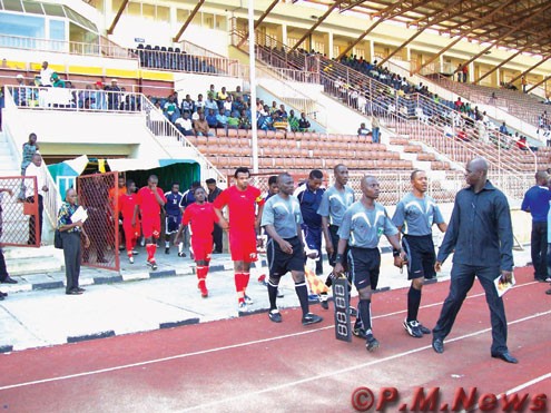 Referees lead out the players of Sunshine Stars of Akure and Rangers International of Enugu before their week four match at the Ijebu-Ode Stadium, Ogun State, Nigeria two weeks ago. Photo: TUNDE OYEDELE.