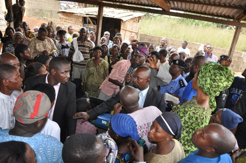 Fashola addressing the crowd at a registration centre in Lagos.