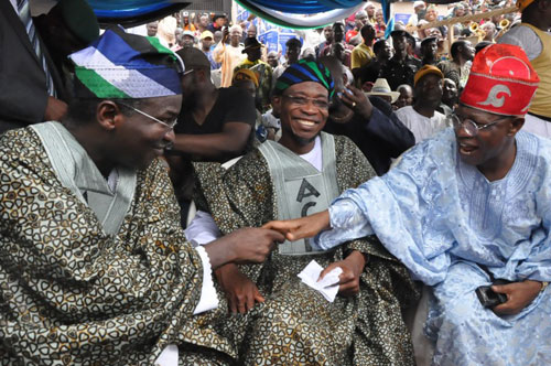 Lagos State Governor, Mr. Babatunde Fashola SAN (left), addressing the jubilant crowd of Action Congress of Nigeria (ACN) supporters during the flag off of the campaign of the ACN Governorship candidate in Oyo State, Senator Abiola Ajumobi held at Mapo Hall, Ibadan, Oyo State on Saturday February 26, 2011.