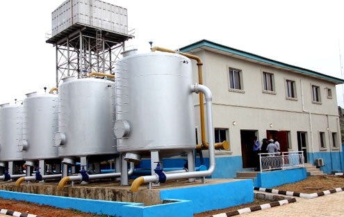 The Ikorodu Mini Water Works Commissioned by the Governor  Babatunde Fashola last week. Inset: Fashola (middle), cutting the ribbon to commission the Mini Water Works. With him are: Action Congress of Nigeria (ACN) Senatorial Candidate for Lagos East, Alhaji Gbenga Ashafa (left), General Manager, Lagos State Water Corporation (LSWC), Mrs. Dele Fatusi (2nd left), House of Representatives member, Hon Abike Dabiri-Erewa and Lagos State House of Assembly member, Hon Sinai Agunbiade (right).