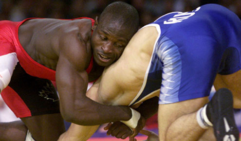Igali (right) in action for Canada.