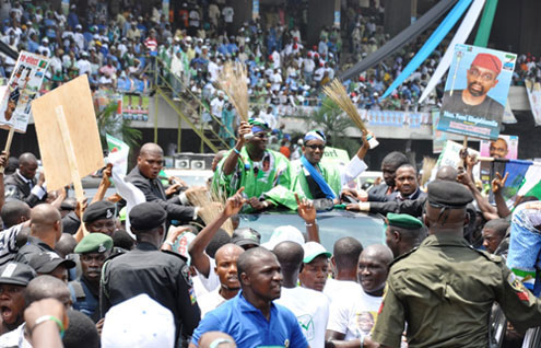 Lagos State Governor, Mr. Babatunde Fashola SAN (left), with the ACN Presidential Candidate, Mallam Nuhu Ribadu (middle) and ACN Vice Presidential Candidate, Chief Fola Adeola acknowledging cheers from the party supporters during a rally to flag-off of the Governorship campaign rally of the party with the theme: â€œContinuity of Excellenceâ€ at the Tafawa Balewa Square, Lagos, on Saturday March 5, 2011.