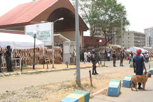 Front view of the Independent National Electoral Commission Headquarter in Abuja. with armed Policemen this morning.