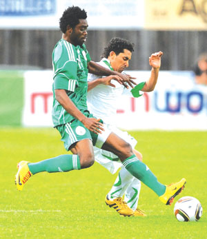 Lukman in action for Nigeria during a friendly match against Saudi Arabia.