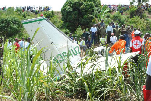 Picture of the crashed plane with rescuers at the Barkallahu scene of the crash.