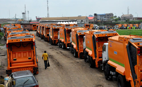 A cross section of the 100 new compactor (rear loader) trucks handed over by the Governor of Lagos State, Mr. Babatunde Fashola (SAN) to PSP Operators in the State at the Olusosun Landfill, by Motorways, 7up Lagos, on Monday, June 20, 2011.