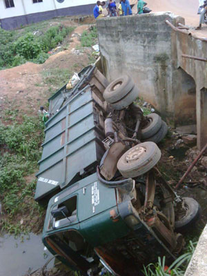 The truck driven by the late driver in the canal