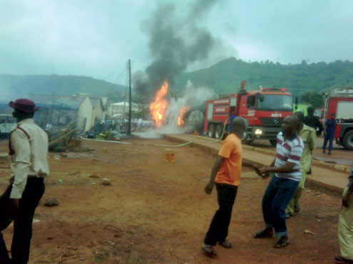 Scene of petrol tanker fire in Enugu this morning. PHOTO: JUDE ORJI.