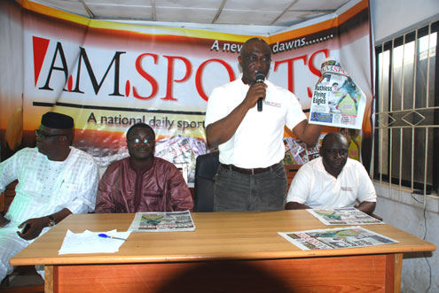 Top: Mr. Bayo Onanuga, MD/EIC, Independent Communications Network Limited, publishers of AM Sports (standing), at the presentation of the new sports newspaper to the media today at NUJ House, Alausa, Ikeja, Lagos. Bottom: L-R: Senator Babafemi Ojudu, Mr. Kunle Ajibade, Bayo Onanuga and Babajide Kolade-Otitoju, at the event. PHOTOS: ABEEB OGUNBADEJO.