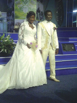 Mercy Johnson stepping out from the altar at Christ Embassy after exchanging marital vows.