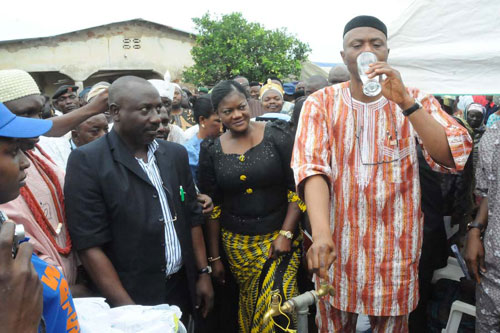 Chairman of the Ondo State Water and Sanitation Agency (WATSAN), Wife of the State Governor, Mrs. Olukemi Mimiko and Ondo State Governor, Dr Olusegun Mimiko during the commissioning of Accelerated Rural Water Supply Scheme otherwise known as â€œKAMONIâ€ in Ajowa-Akoko on Friday.