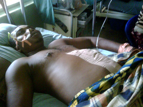 Stanley Ukpabia a.k.a Randy receiving treatment at Barau Dikko Hospital ,Kaduna after he was allegedly shot by the police