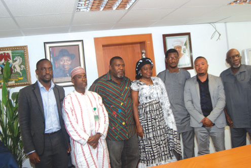 The minister flanked by the AIFF team.