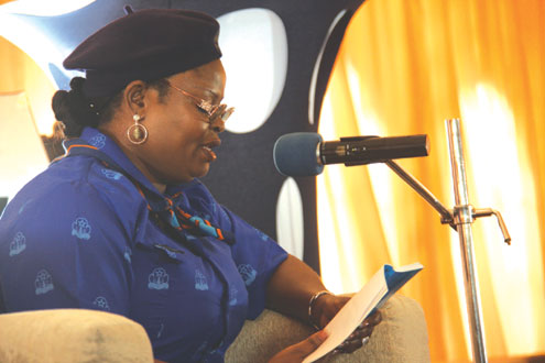 Lagos State Deputy Governor, Adejoke Orelope-Adefulire reading from the book, Time Changes Yesterday during todayâ€™s world record breaking event to mark this yearâ€™s World Literacy Day.  PHOTOS: IDOWU OGUNLEYE.