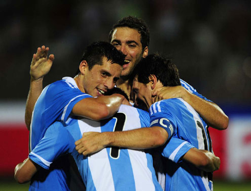 Argentina players celebrate their sweet revenge over the Super Eagles of Nigeria after beating them 3-1 in an international friendly rematch in Dhaka, Bangladesh today. PHOTO: AFP.