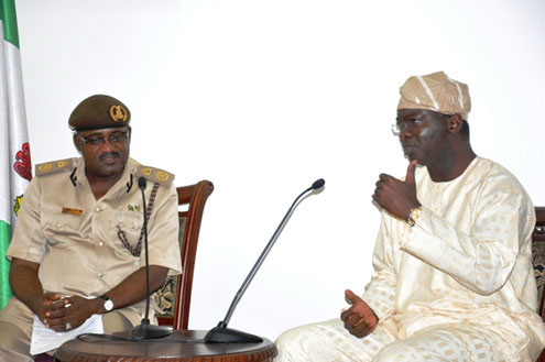 Lagos State Governor, Mr. Babatunde Fashola SAN (right) with the Comptroller, Immigration Service, Lagos State Command, Alhaji Abass Ahmed (left) during a courtesy call on the Governor by the Comptroller and other senior officers of the Service at State House, Alausa, Ikeja, on Friday, September 9, 2011.
