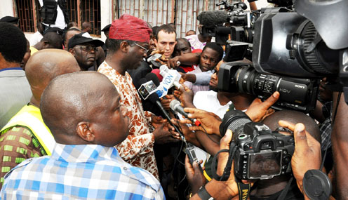 Lagos State Governor Mr. Babatunde Fashola  SAN answering questions from the newsmen after casting his vote at Ward G3 Iponri in Surulere  during the Election into  the 20 Local Government  Councils  and 37 Local Council  Development Area s (LCDA), in the State on Saturday October 22, 2011