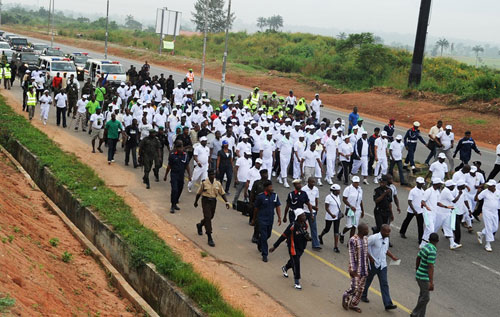 Osun State Governor, Ogbeni Rauf Aregbesola, leading other executive members on a Road Walk, tagged: Osun Walk to Live-Restoring a healthy living through physical exercise, in Osogbo, Osun State on Saturday 12-11-2011  Photo: State House