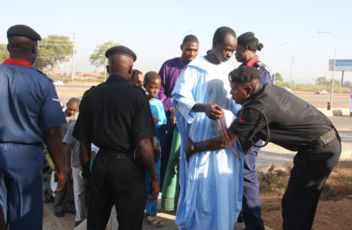 Faces of faithfuls Muslims, from the Eid EL-Kabir Prayers, held at the Muslims National Prayer ground along Airport road, Abuja, Nigeria, on Sunday 6, 2011.