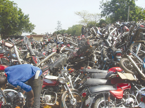 Seized motorcycles stacked at the Tax Force office in Alausa, Ikeja, Lagos