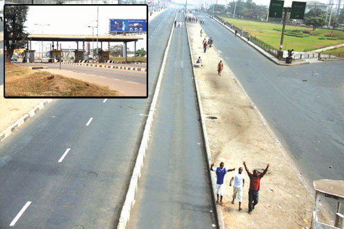 Ikorodu Road, Lagos deserted this morning as nationwide strike entered day 3. Inset: Lagos Airport toll gates shut. PHOTOS: IDOWU OGUNLEYE.