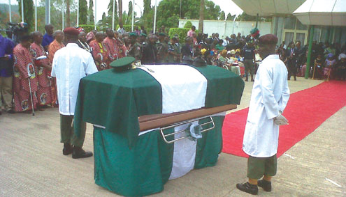 •Draped in Nigeria’s  national colours, the casket bearing the remains of the late Chukwuemeka Odumegwu Ojukwu at the State House, Abuja, this morning. PHOTO: FEMI IPAYE.