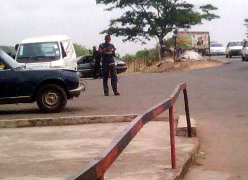 Policemen from Ashi Police Station at a checkpoint near General Gas area of Ibadan this morning. PHOTO: GBENRO ADESINA.