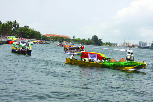 Participants in their colourful boats