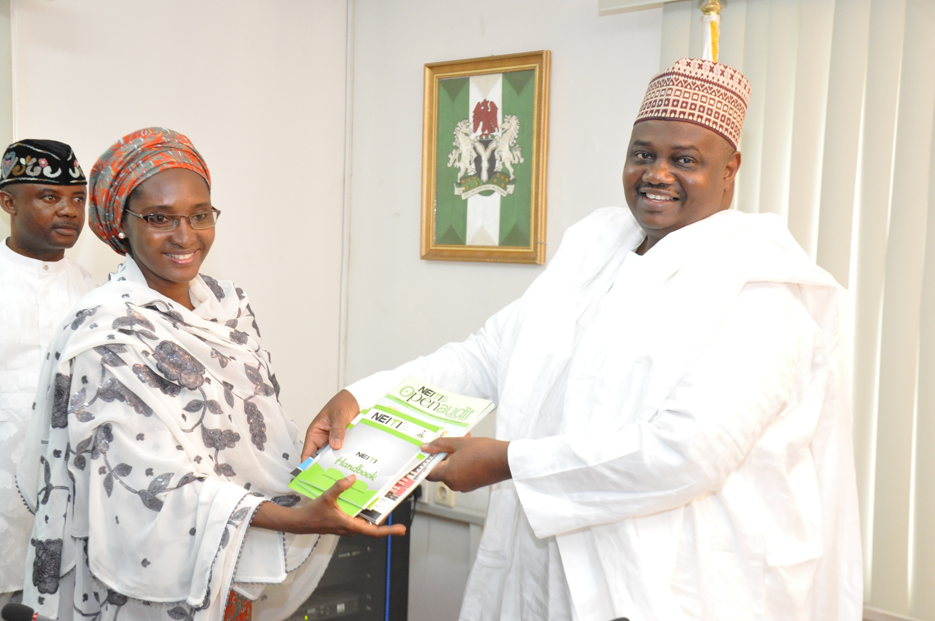 Ibrahim Lamorde, Executive Chairman, EFCC receiving publications from the Executive Secretary of the Nigerian Extractive Industries Transparency Initiative, Zainab Ahmed who led a delegation of members of NEITI’s Management team during a courtesy visit to the Commission’s Headquarters in Abuja, recently.