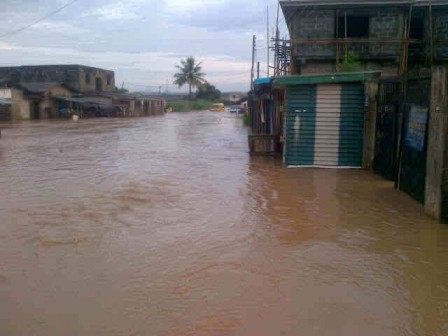 A flooded street at Aboru yesterday. Photo. Yisa Jamiu