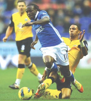 Victor Moses of Wigan is tackled by Steveb N'Zonzi of Blackburn during a recent Barclays Premier League match at the DW Stadium.