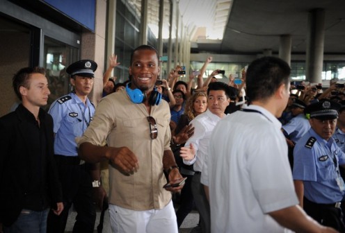 Flasback: Drogba, middle, on arrival in China 